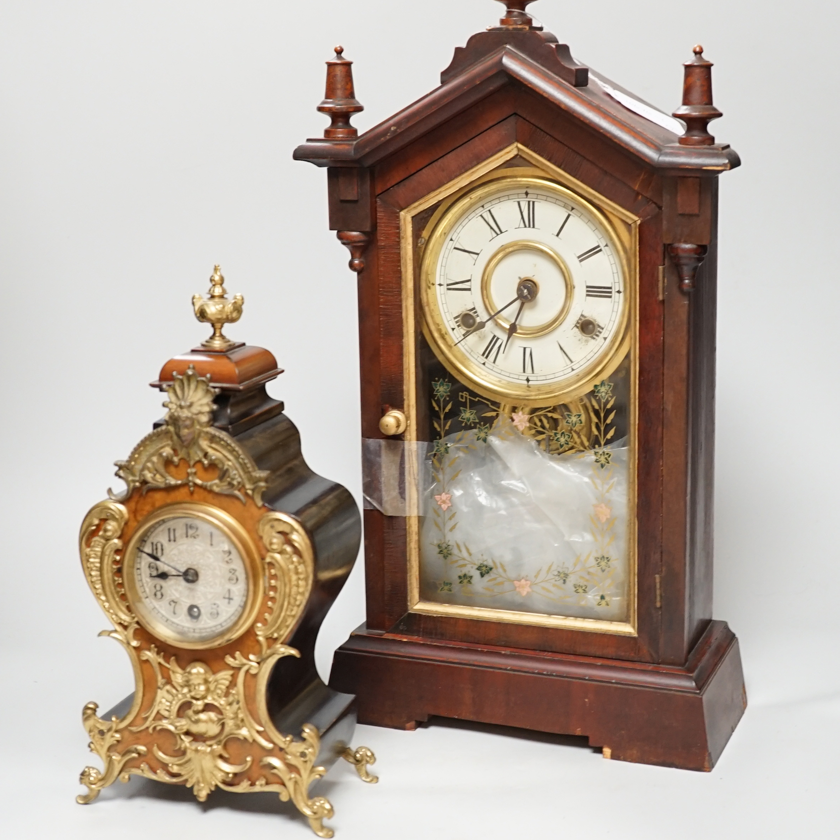 An early 20th century German walnut and gilt metal mantel clock and an American shelf clock, tallest 49cm